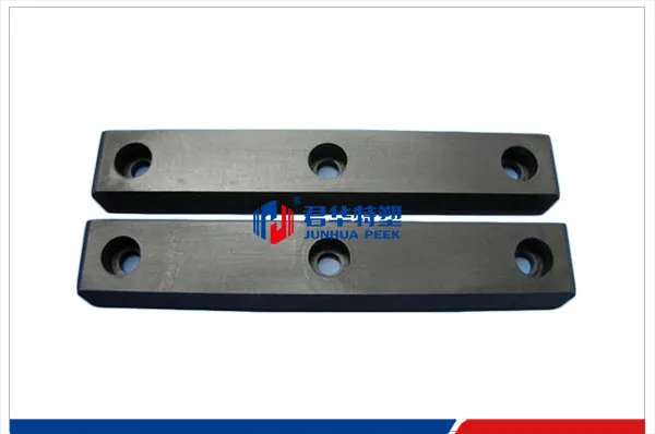 PEEK rail wear strips